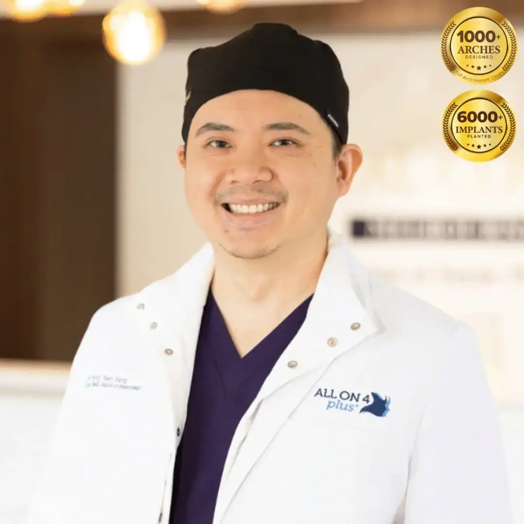 Dental professional Dr Fong Nien Yong smiling in dental clinic.